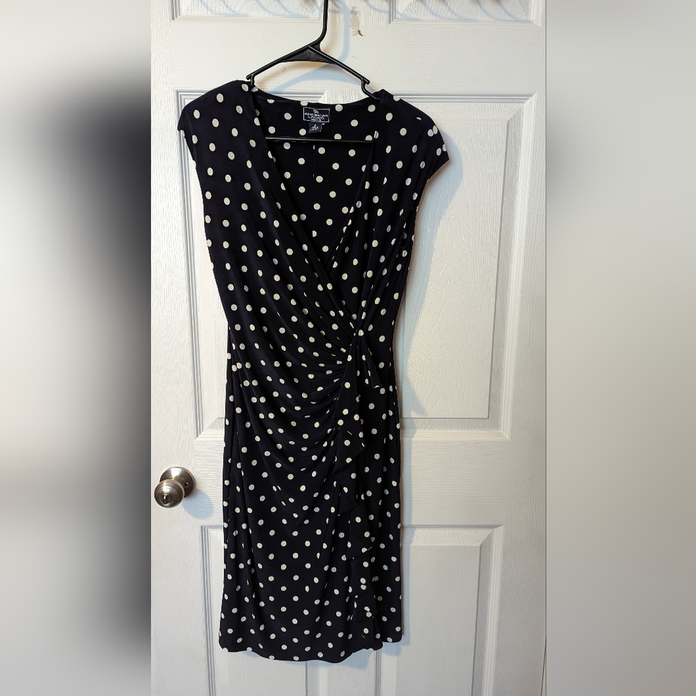 Sleeveless dress with ruching and frill down the front